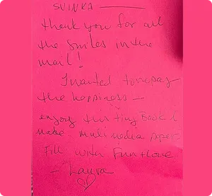 Bright pink card from Laura thanking Svinka for all the smiles in the mail